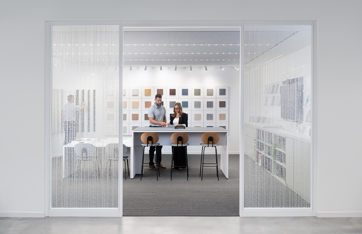 People Walking in an open office area