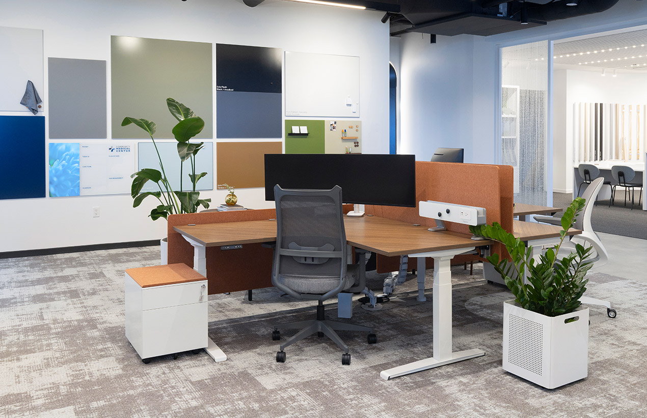 Woman working at a standing desk in an Office Area
