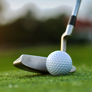 Image of a golf ball and putter