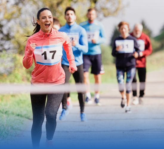 image of event participants running the event route