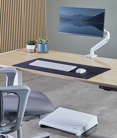 Image of multiple Fellowes Business Products including Monitor Arms, Foot Rest, and Seating